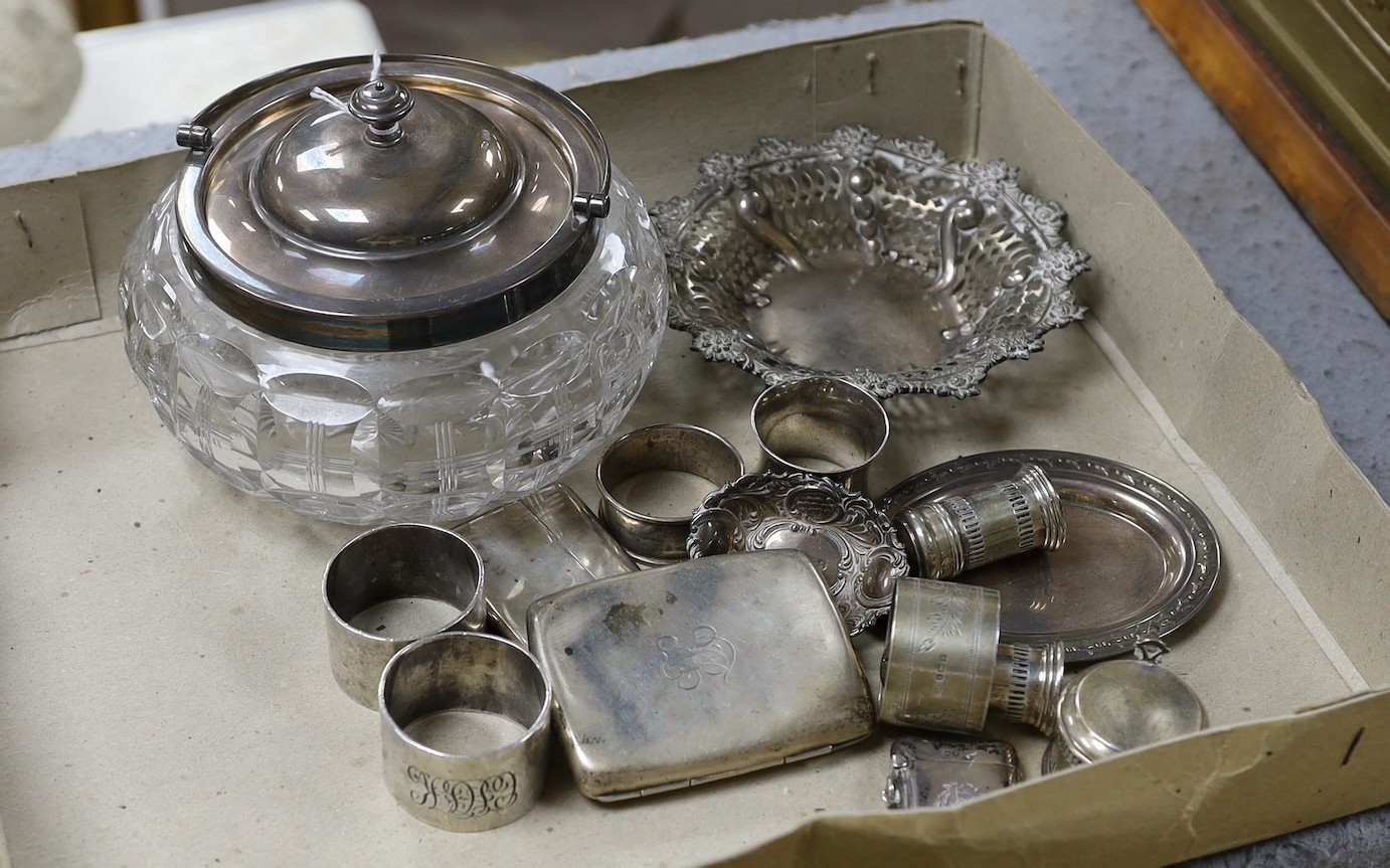 A George V silver mounted glass bowl and cover and other sundry silver including napkin rings, vesta case and condiments.